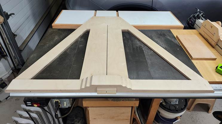 A wood panel on a table

Description automatically generated